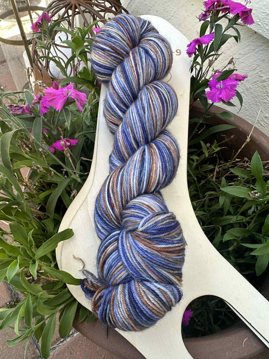 Blue and brown skein of yarn